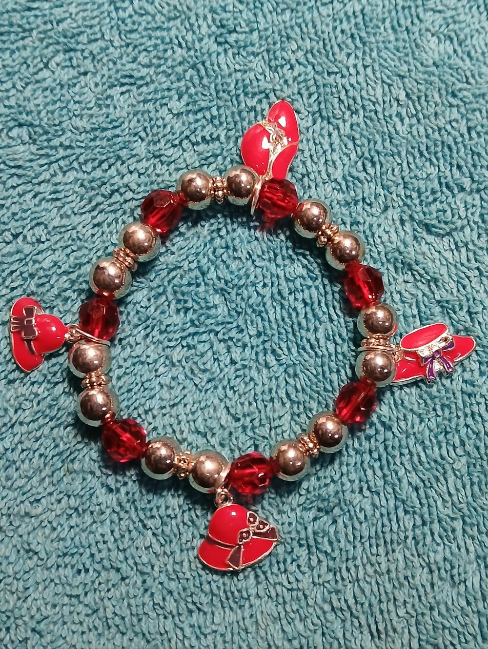 Red Stretch Beaded Bracelet With Red Hats And Silver Accent Beads